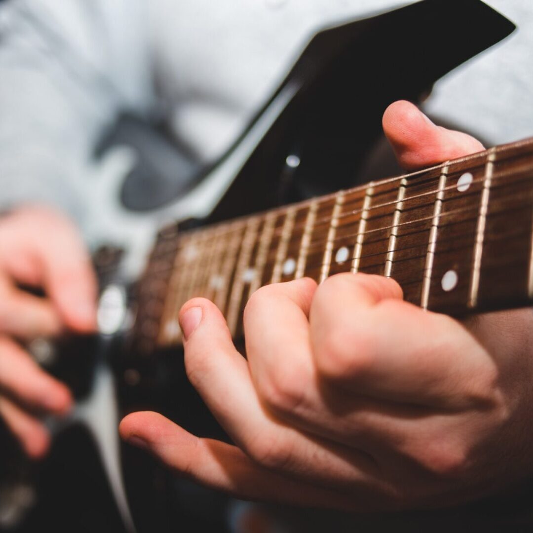 Guitar playing close-up